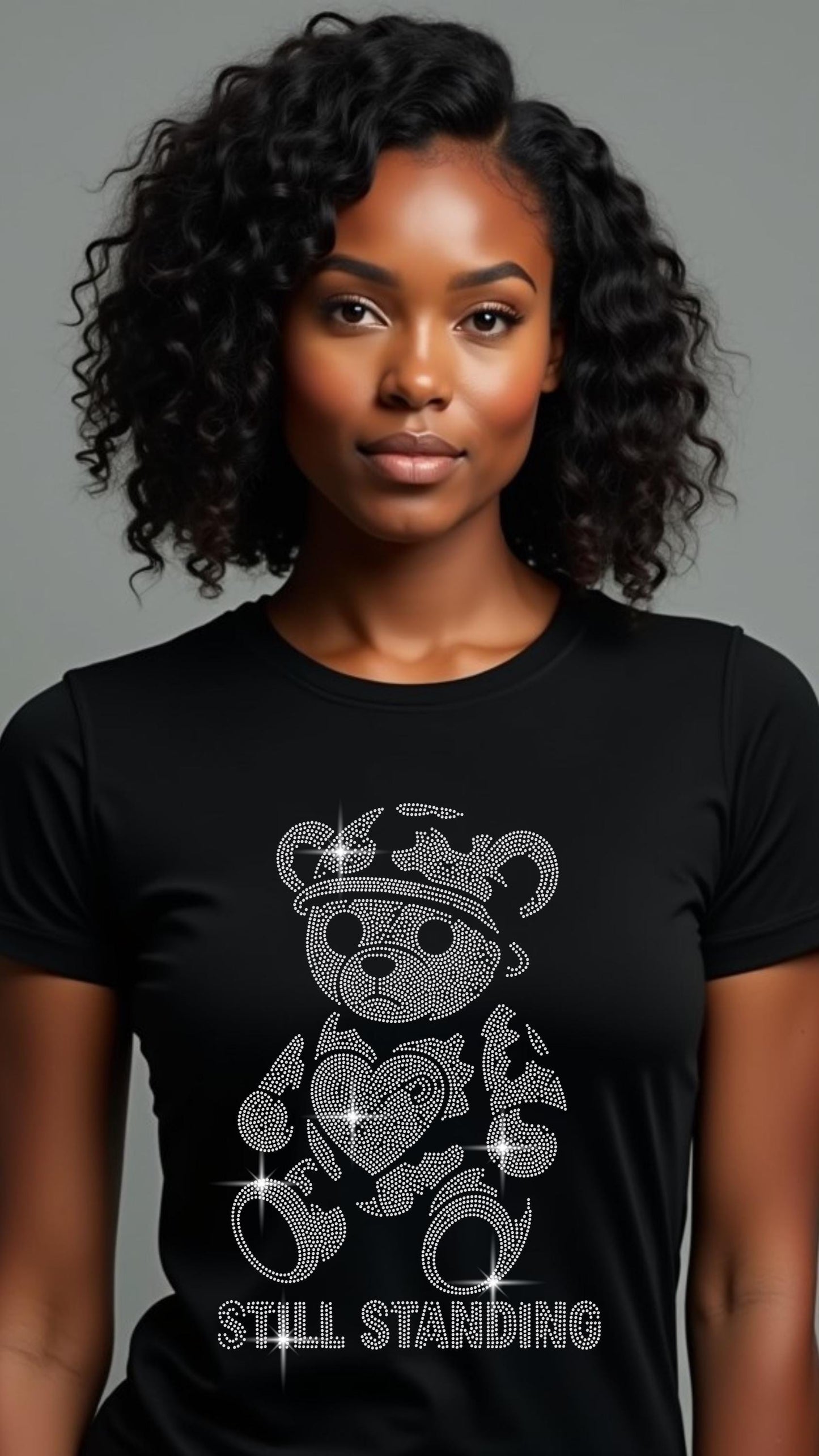 Still Standing crowned teddy bear rhinestone design on black T-shirt